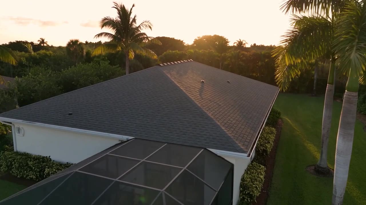 Aerial view of a single-story home with an architectural shingle roof