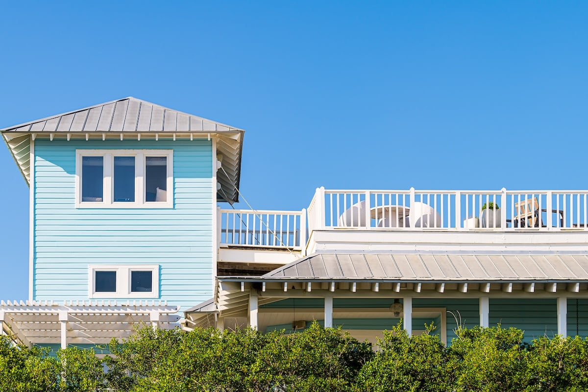 Blue beach house with metal roof