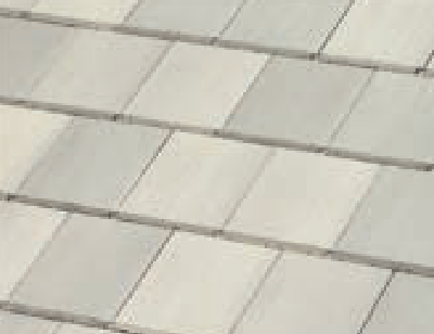 Close-up view of a roof with overlapping light gray and off-white rectangular shingles arranged in neat, diagonal rows.
