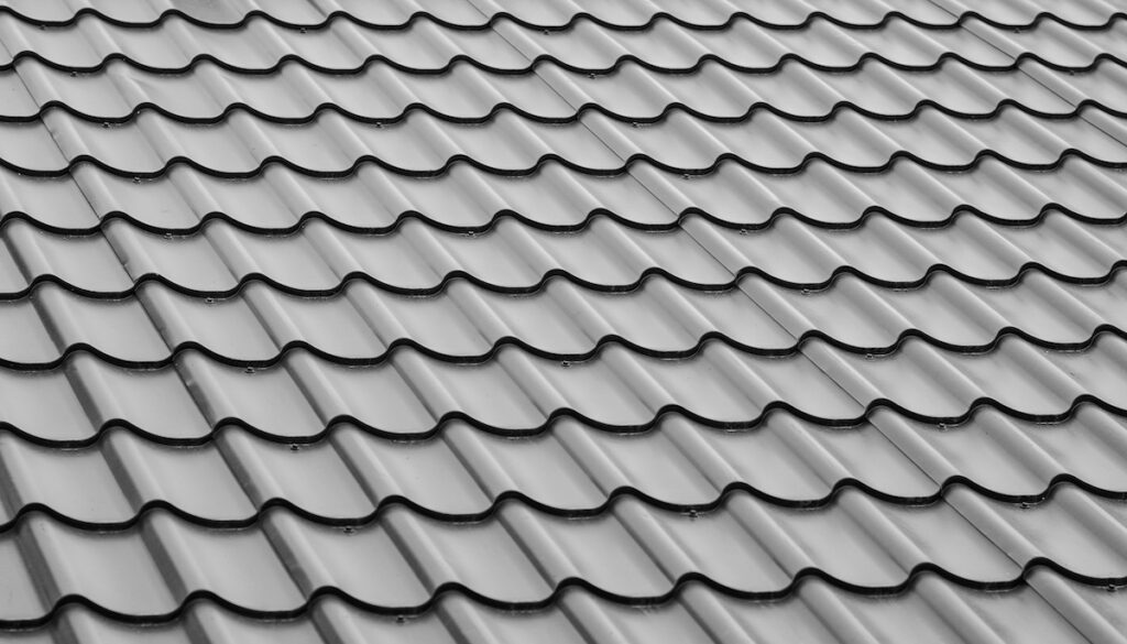 A close-up view of a wavy metal roof