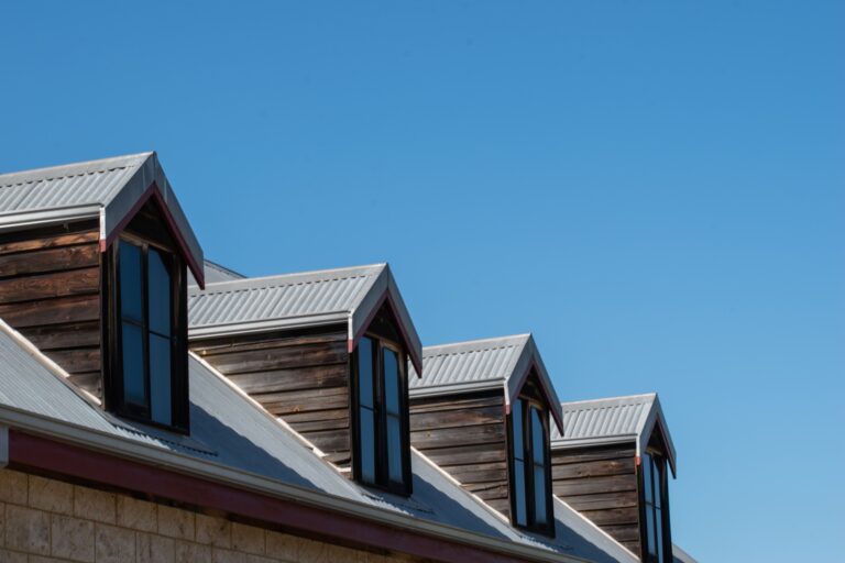 triangular rooftops with windows