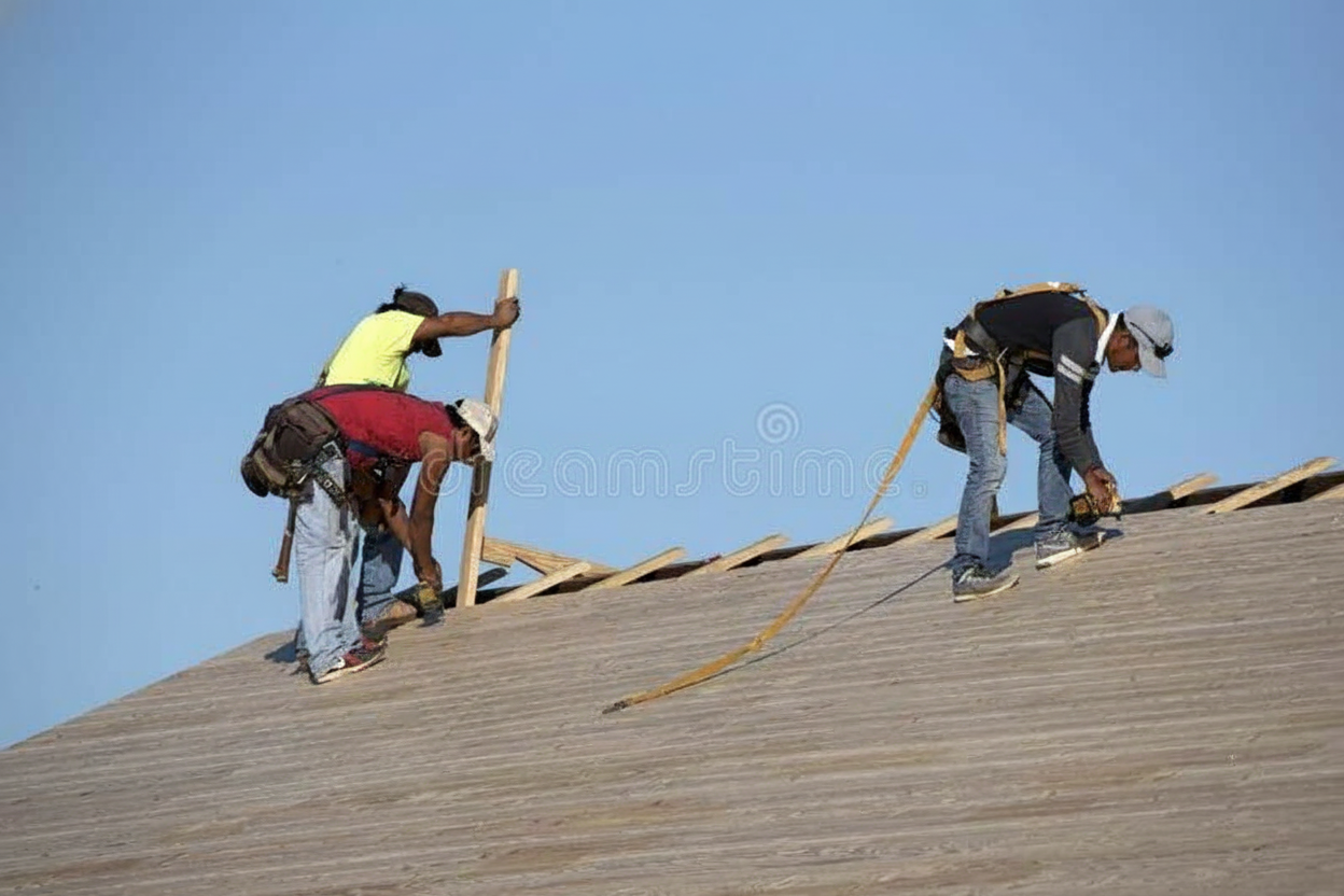 Professional roofer performing maintenance on Florida home