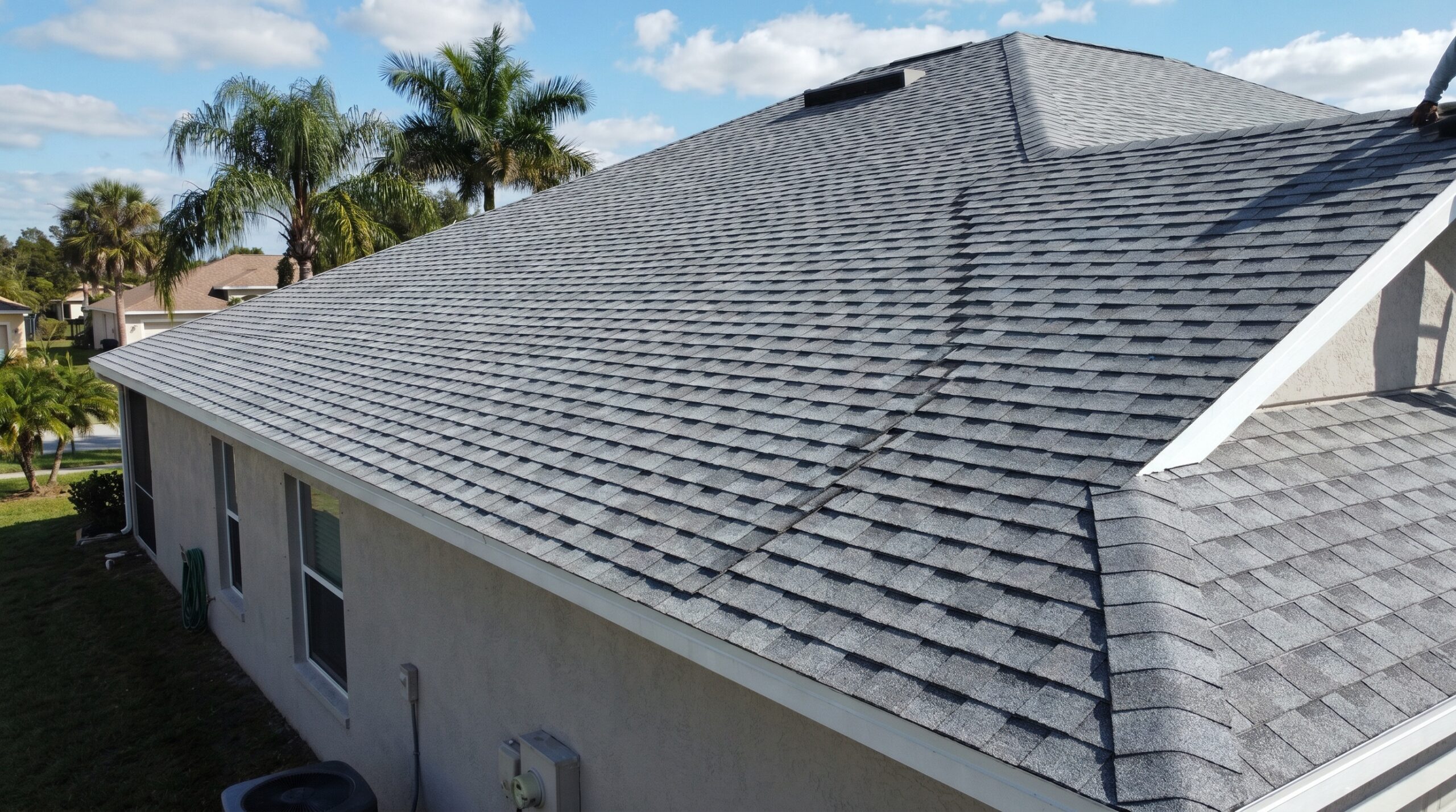 Architectural shingles installation on Florida home showing dimensional texture