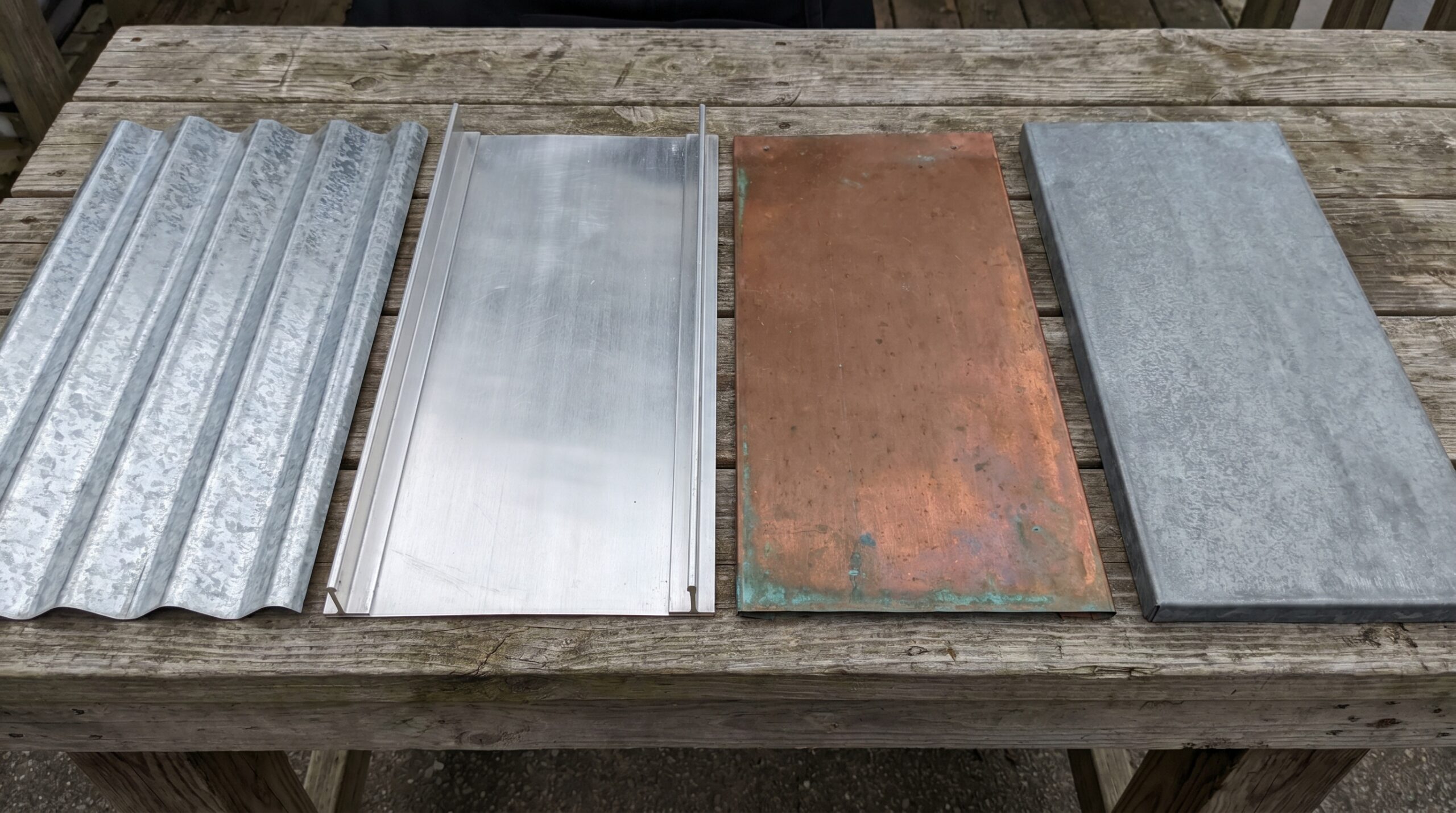 Comparison of different metal roofing materials samples