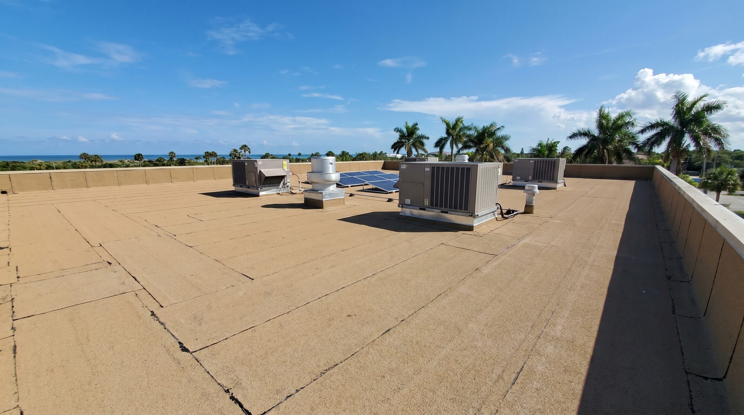 Florida commercial building with completed modified bitumen roof installation