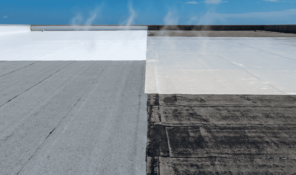 A flat rooftop shows four sections with different materials and colors, including gray, white, and beige, with heat waves rising from one section under a blue sky.